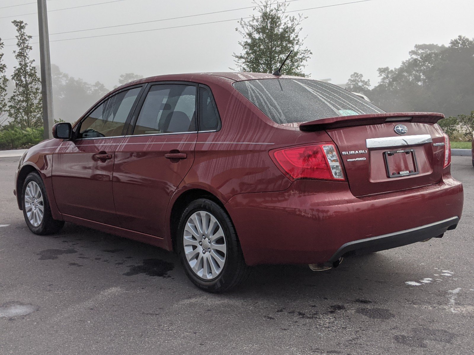 Pre-Owned 2011 Subaru Impreza Sedan 2.5i Premium AWD 4dr Car